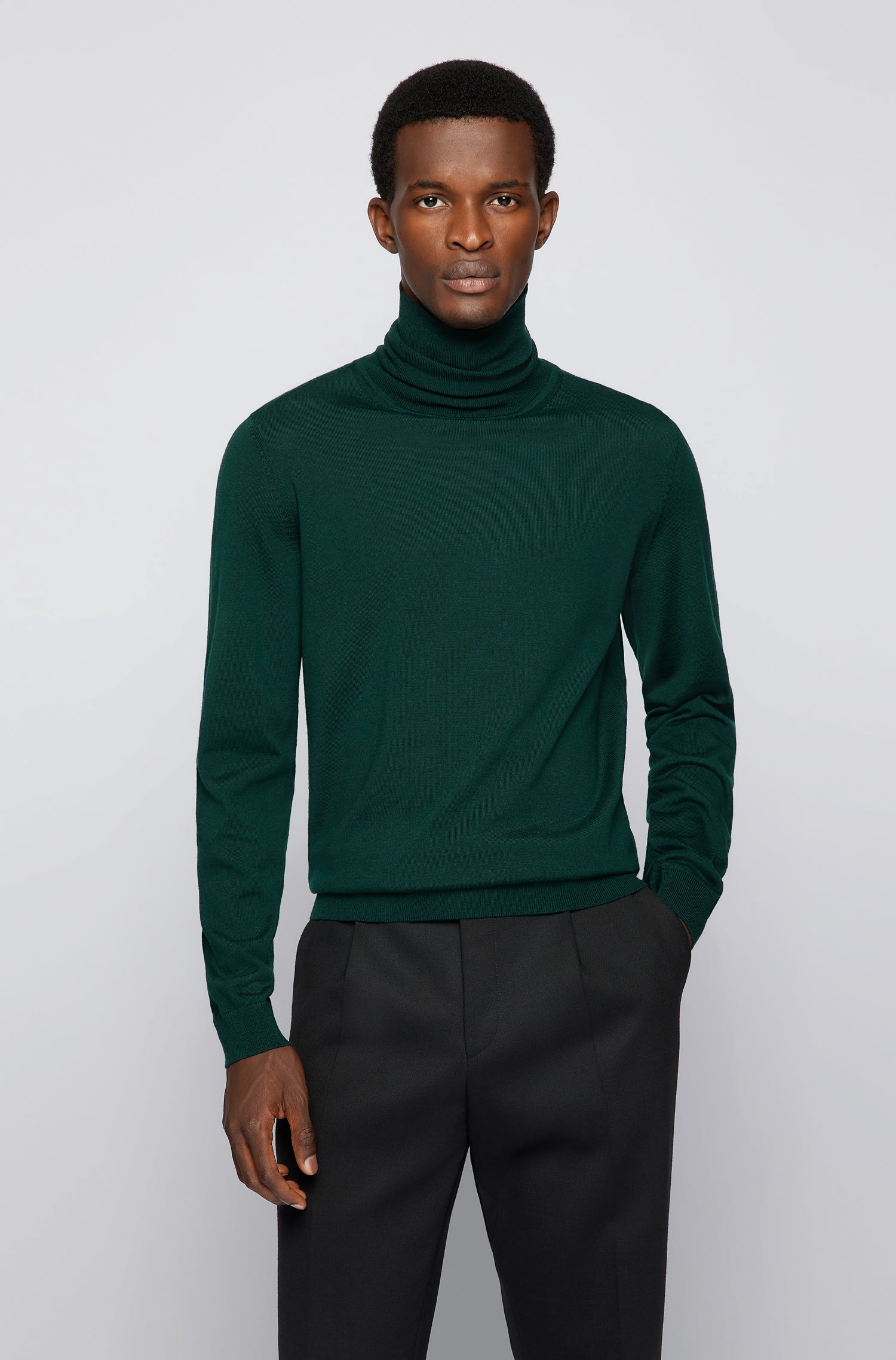 Men's White Horizontal Striped Crew-neck Sweater, Dark Green Wool Dress  Pants, Burgundy Leather Chelsea Boots, Green Canvas Holdall